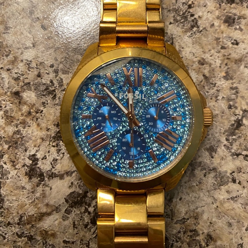 Women’s Fossil watch.